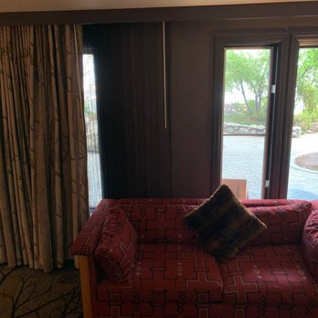 Shore Lodge - Curtains are mis-installed; you can't explose the window on the left, probably to leave room for hot air from the heater - Resorts Near Me - McCall, Idaho Shore Lodge - Curtains are mis-installed; you can't explose the window on the left, probably to leave room for hot air from the heater - Resorts Near Me - McCall, Idaho