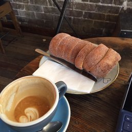 Large flat white, cinnamon Kurtosh