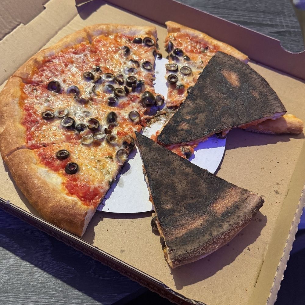 Entire bottom of pizza is burnt.... Entire bottom of pizza is burnt....