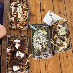 Loaded Hawthorne Fries, Loaded Tilikum Fries with slaw on the side and Loaded Sellwood Fries. Loaded Hawthorne Fries, Loaded Tilikum Fries with slaw on the side and Loaded Sellwood Fries.