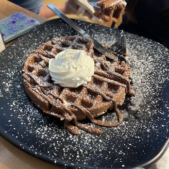 Waffle’s Town - a person eating a waffle - Breakfast & Brunch Near Me - Bayamón, Puerto Rico Waffle’s Town - a person eating a waffle - Breakfast & Brunch Near Me - Bayamón, Puerto Rico