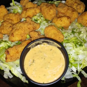 Riptides Raw Bar & Grill - Gator bites! Way better than I thought. Taste like boneless chicken wings! - Seafood Near Me - Ormond Beach, Florida Riptides Raw Bar & Grill - Gator bites! Way better than I thought. Taste like boneless chicken wings! - Seafood Near Me - Ormond Beach, Florida