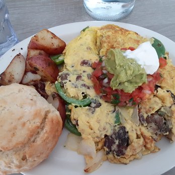 Millie's Cafe - Pasadena - Hangtown Fry (3 scrambled eggs, bacon, oyster, bell pepper, onions, with guac, salsa, sour cream, biscuit, potatoes). - Breakfast & Brunch Near Me - Pasadena, California Millie's Cafe - Pasadena - Hangtown Fry (3 scrambled eggs, bacon, oyster, bell pepper, onions, with guac, salsa, sour cream, biscuit, potatoes). - Breakfast & Brunch Near Me - Pasadena, California