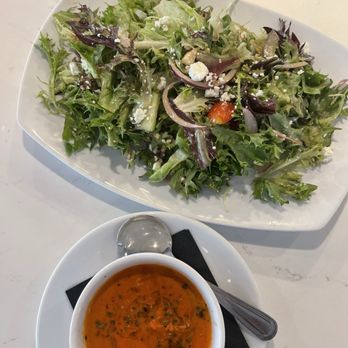 Agio Italian & Steak - House salad with tomato bisque. Dressing had a hint of anchovy maybe. Not too heavy with cream in the bisque makes it better - Italian Near Me - Brunswick, Georgia Agio Italian & Steak - House salad with tomato bisque. Dressing had a hint of anchovy maybe. Not too heavy with cream in the bisque makes it better - Italian Near Me - Brunswick, Georgia