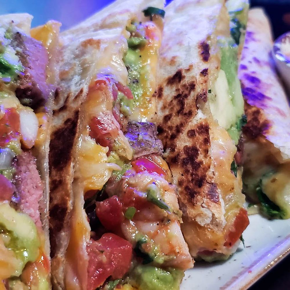 BuenoMalo - Steak and Shrimp quesadilla with avocados - Mexican Near Me - Andover, Massachusetts BuenoMalo - Steak and Shrimp quesadilla with avocados - Mexican Near Me - Andover, Massachusetts