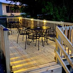 Betsie Riverside Resort - C10_11 deck with night lighting