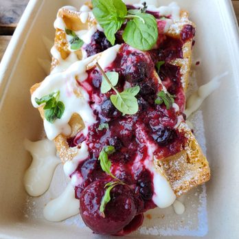 Eggbred - Mixed Berry Cheesecake Waffle: belgian waffle, cheesecake drizzle, mixed berry compote powdered sugar, mint - Breakfast & Brunch Near Me - La Habra, California