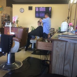 Quality Barber Shop - My baby getting his hair done! It's summer and it's hot! Time to chop it all off lol