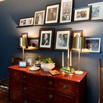 Walnut+Ash Interiors - Lighting and picture ledges in dining room. - Interior Design Near Me