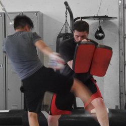 Unbridled Martial Arts - Muay thai round kicks!