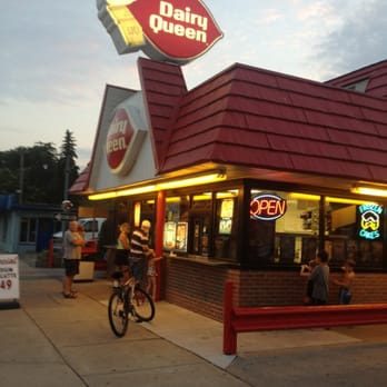 Dairy Queen Ltd Brazier - a man on a bicycle in front of a dairy queen - Ice Cream & Frozen Yogurt Near Me - Algonac, Michigan Dairy Queen Ltd Brazier - a man on a bicycle in front of a dairy queen - Ice Cream & Frozen Yogurt Near Me - Algonac, Michigan