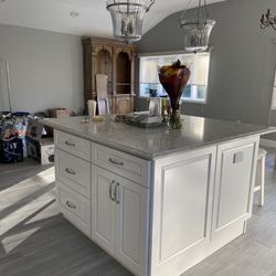 Milano Kitchen & Bath - Outlets in the island are and added convenience. Draws & cabinets on both side are amazing for added storage
