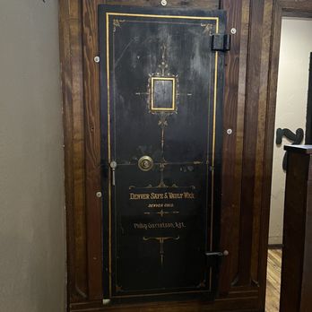 357 Bar and Grill - Cool safe door on the way to the bathrooms. Not sure if it's real. This was the post office back in the day. - Sports Bars Near Me - Palisade, Colorado