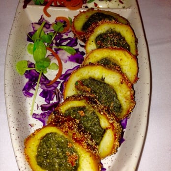 Khazana by Chef Sanjeev Kapoor - Loved this baked potatoes dish with stuffings. It has poppy seeds on the crusty outside. I will go back again for this appetizer - Indian Near Me - Brampton, Ontario Khazana by Chef Sanjeev Kapoor - Loved this baked potatoes dish with stuffings. It has poppy seeds on the crusty outside. I will go back again for this appetizer - Indian Near Me - Brampton, Ontario