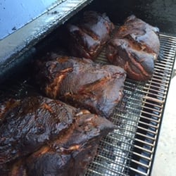 Pork Daddy's BBQ - Chipotle - Lime pork for pulled pork tacos with cilantro, onions, radish, and a fresh wedge of lime