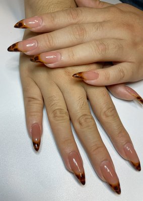 Tortoiseshell French long almond shaped nails - My client asked for tortoiseshell French nails with a flesh tone base. Tortoiseshell French long almond shaped nails - My client asked for tortoiseshell French nails with a flesh tone base.