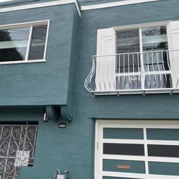 Finished iron juliet balcony with curved bars Finished iron juliet balcony with curved bars