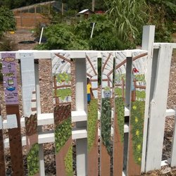 Fresh Future Farm - Colorful mural paintings cover the fence