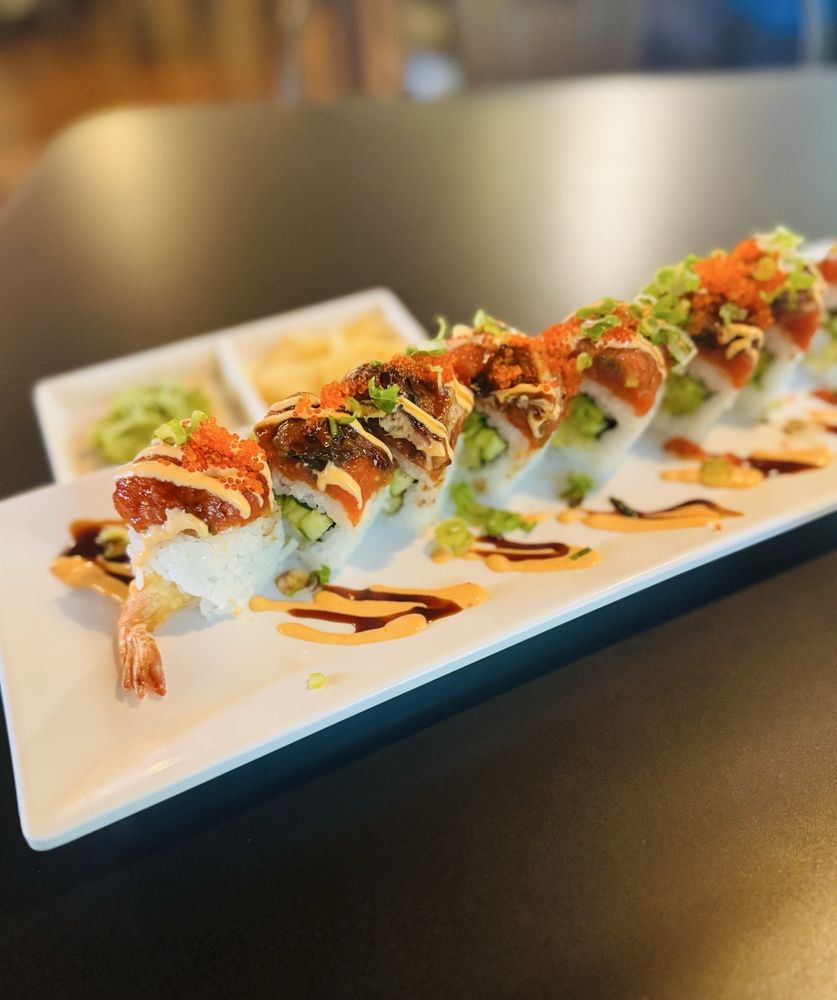 Tae's Edo Sushi Bar & Grill Logo