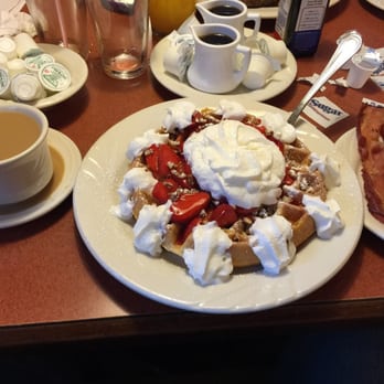 Lume's Pancake House - Belgian waffles with whip cream strawberries and bacon with side coffee - Pancakes Near Me - Chicago, Illinois Lume's Pancake House - Belgian waffles with whip cream strawberries and bacon with side coffee - Pancakes Near Me - Chicago, Illinois