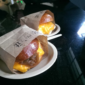 Eggslut - Fairfax on left; Bacon, Egg, And Cheese on right. - Breakfast & Brunch Near Me - Los Angeles, California Eggslut - Fairfax on left; Bacon, Egg, And Cheese on right. - Breakfast & Brunch Near Me - Los Angeles, California