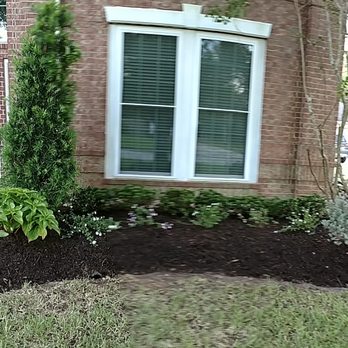 Trademark Landscape - the front of a brick house - Landscaping Near Me - Webster, Texas Trademark Landscape - the front of a brick house - Landscaping Near Me - Webster, Texas
