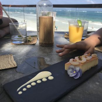 Restaurante Mezzanine - Flan (and a to-go mango marg in the background) - Thai Near Me - Tulum, ROO