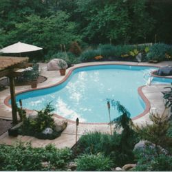 Classic Pools - Note the spa portion on the right; well worth the extra expense to enable use of the pool for 2 extra months each year.