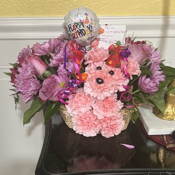 Florecita Flower Shop - Floral arrangement delivered, so beautiful! Used pink carnations because they were out of white, added in roses & balloon! - Florists Near Me - Chula Vista, California Florecita Flower Shop - Floral arrangement delivered, so beautiful! Used pink carnations because they were out of white, added in roses & balloon! - Florists Near Me - Chula Vista, California