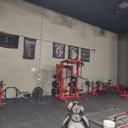 Blackheart CrossFit and Powerlifting - All the walls have inspirational  flags on the walls.