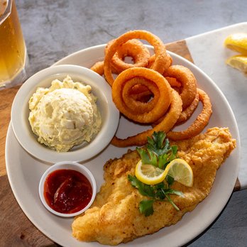 Mulligan's Sports Bar & Grill - fish and onion rings - Sports Bars Near Me - Bartow, Florida Mulligan's Sports Bar & Grill - fish and onion rings - Sports Bars Near Me - Bartow, Florida