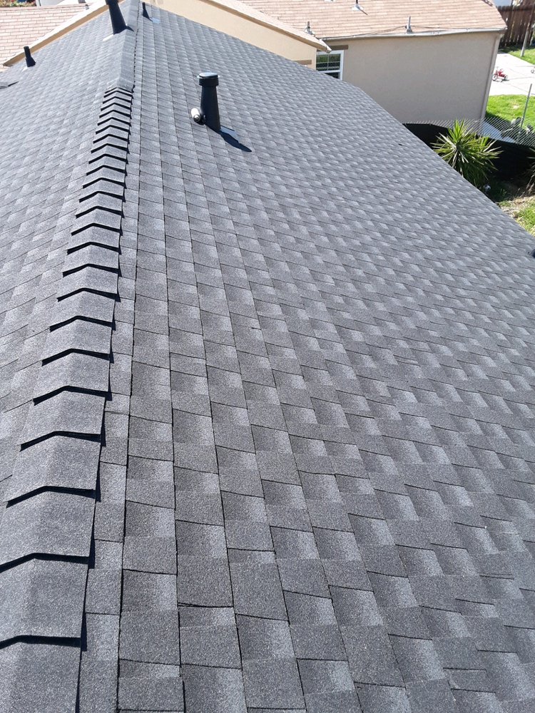 Slide of Everest Roofing