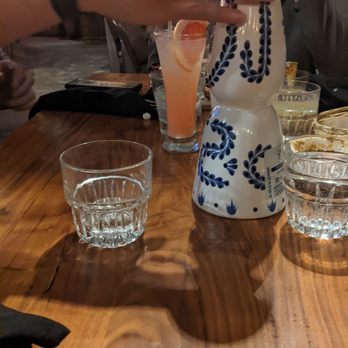 Perla - They reuse their tequila bottles for water, lovely idea. - Tapas/Small Plates Near Me - Santa Ana, California