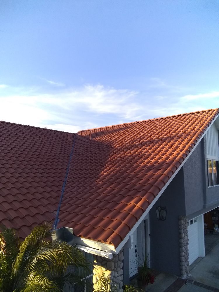 Slide of Tello's Roofing