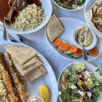 Olympic Cafe - Wild Shrimp Skewers, Lamb Shank, Fried Calamari, Hummus, Side Greek Salad - Mediterranean Near Me - San Diego, California Olympic Cafe - Wild Shrimp Skewers, Lamb Shank, Fried Calamari, Hummus, Side Greek Salad - Mediterranean Near Me - San Diego, California