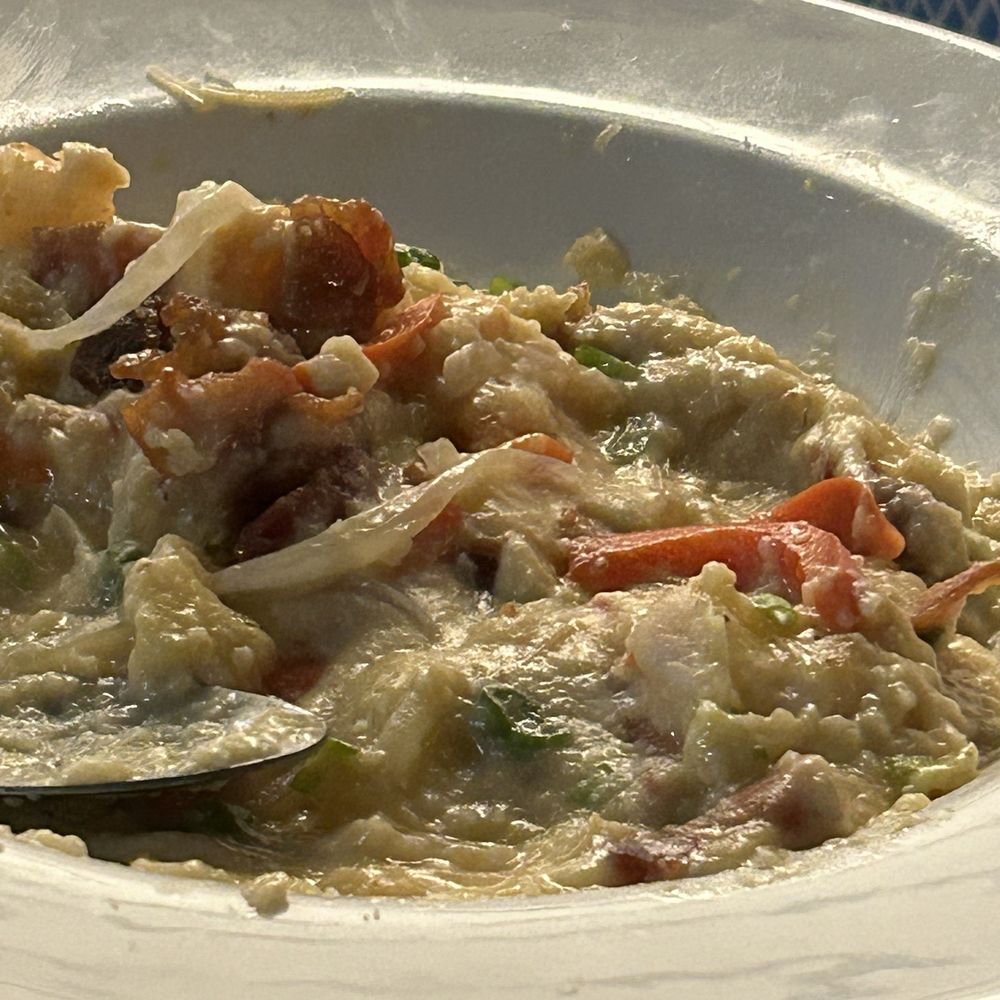 Half Shells - Shrimp and grits in a gelatinous mass of cold butter, greasy off tasting shrimp - Fish & Chips Near Me - Katy, Texas Half Shells - Shrimp and grits in a gelatinous mass of cold butter, greasy off tasting shrimp - Fish & Chips Near Me - Katy, Texas
