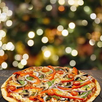 Freshslice Pizza - a christmas tree in the background - Pizza Near Me - Richmond, British Columbia Freshslice Pizza - a christmas tree in the background - Pizza Near Me - Richmond, British Columbia