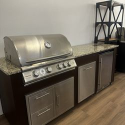 Blaze Gas Grill in 7 Ft Island with Door Drawer Combo, Trash Pull Out and Refrigerator