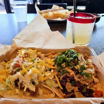 Torchy's Tacos - The "Trailer Park" Taco (left), and the "Republican" Taco (right). - Tex-Mex Near Me - Houston, Texas Torchy's Tacos - The "Trailer Park" Taco (left), and the "Republican" Taco (right). - Tex-Mex Near Me - Houston, Texas