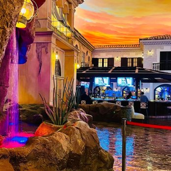 Oyster Bar - a colorful waterfall flowing down the side of a building - Seafood Near Me - Henderson, Nevada Oyster Bar - a colorful waterfall flowing down the side of a building - Seafood Near Me - Henderson, Nevada