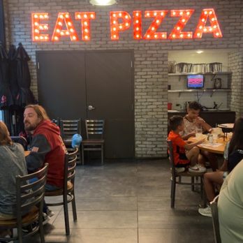 Giordano's - Eat pizza sign - Pizza Near Me - Denver, Colorado