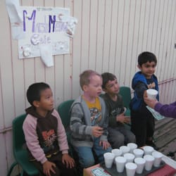 Coastside Children's Programs - Preschoolers selling goods to the older children.