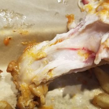 Buffalo Wild Wings - Raw bloody chicken wing - American Near Me - Westerville, Ohio Buffalo Wild Wings - Raw bloody chicken wing - American Near Me - Westerville, Ohio