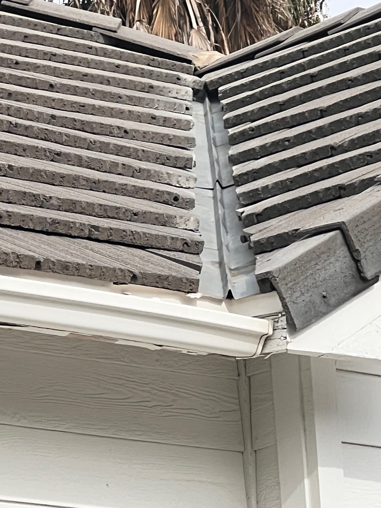 Slide of Alexander’s Roofing