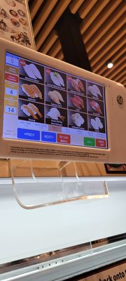 Kura Revolving Sushi Bar by null