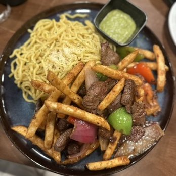 Sona Fusion Kitchen - Lomo Saltado with garlic noodles - Asian Fusion Near Me - Anaheim, California Sona Fusion Kitchen - Lomo Saltado with garlic noodles - Asian Fusion Near Me - Anaheim, California