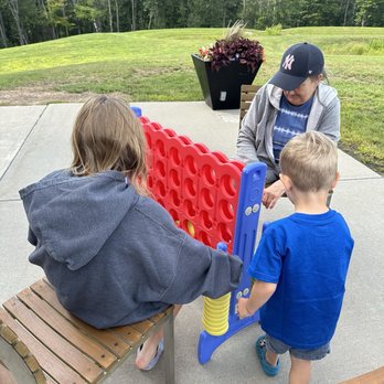 Dos Gatos Cantina - Playing lawn games - Mexican Near Me - Monticello, New York