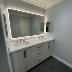 Endless Kitchen & Bath - Complete bathroom remodel with semi custom vanity and 60" LED mirror