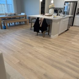 Before is carpet. After is the Luxury Vinyl Planks.