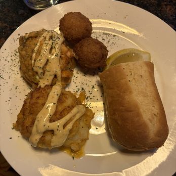Hyman's Seafood - Chilean Sea Bass Croquetes with Garlic Bread and Hush Puppies - Seafood Near Me - Charleston, South Carolina Hyman's Seafood - Chilean Sea Bass Croquetes with Garlic Bread and Hush Puppies - Seafood Near Me - Charleston, South Carolina